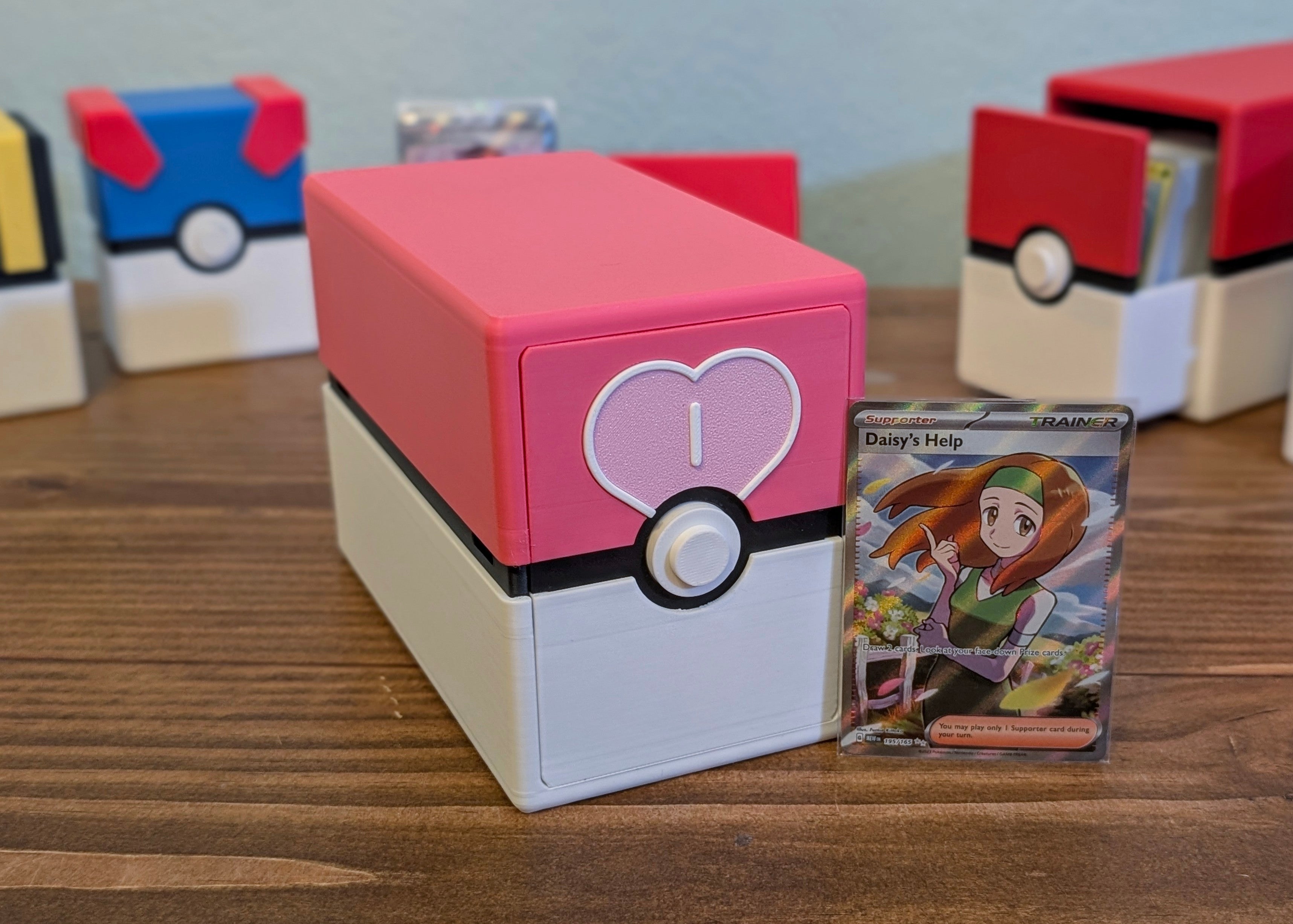 A front view of the Love Ball version of the Pokemon Card Storage.